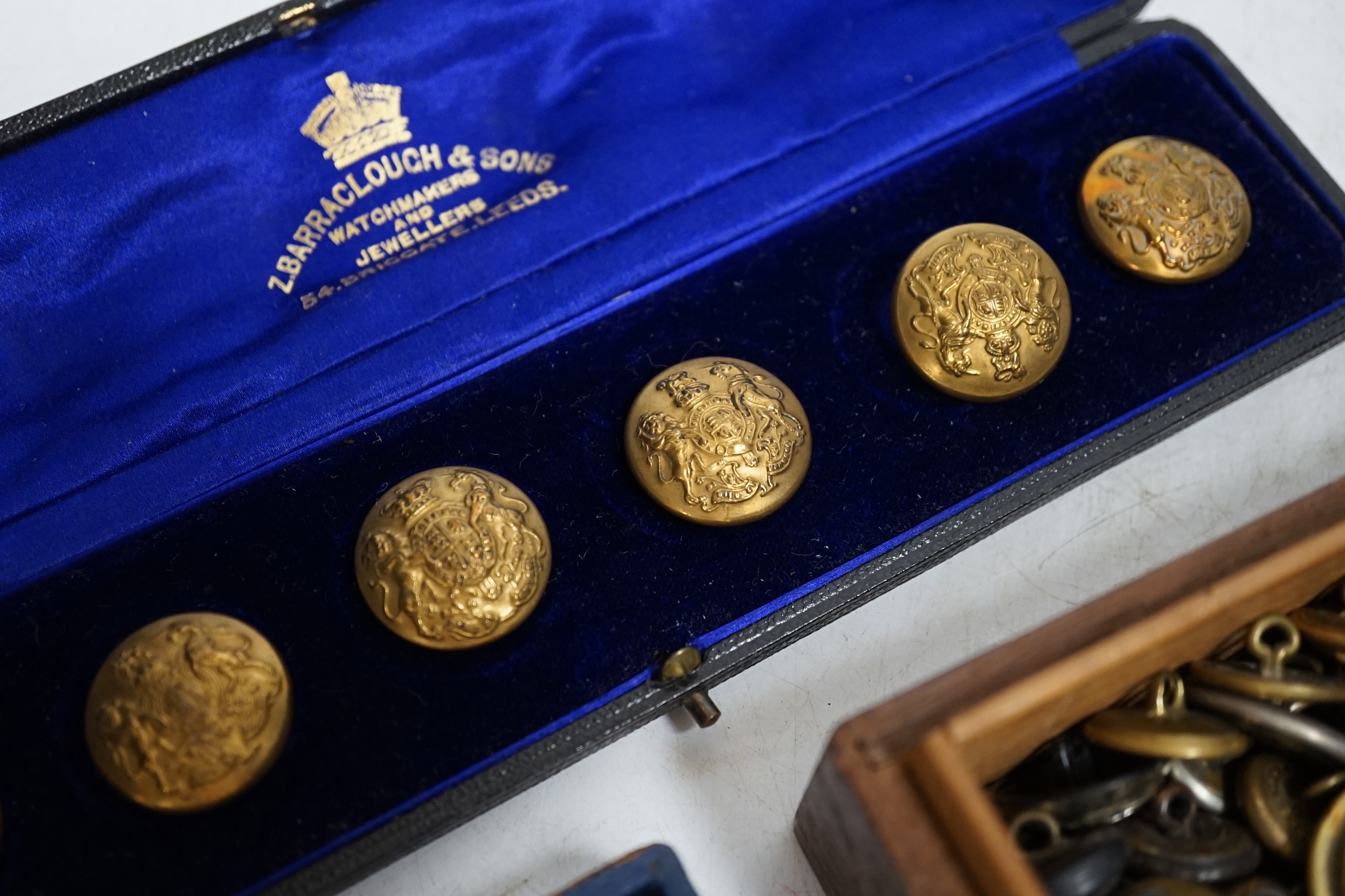 A large collection of military buttons etc. Condition - varies